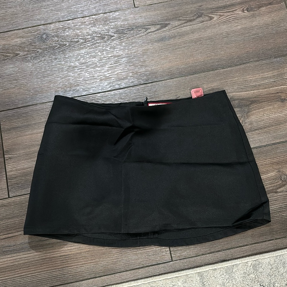 Black low rise mini skirt with shorts